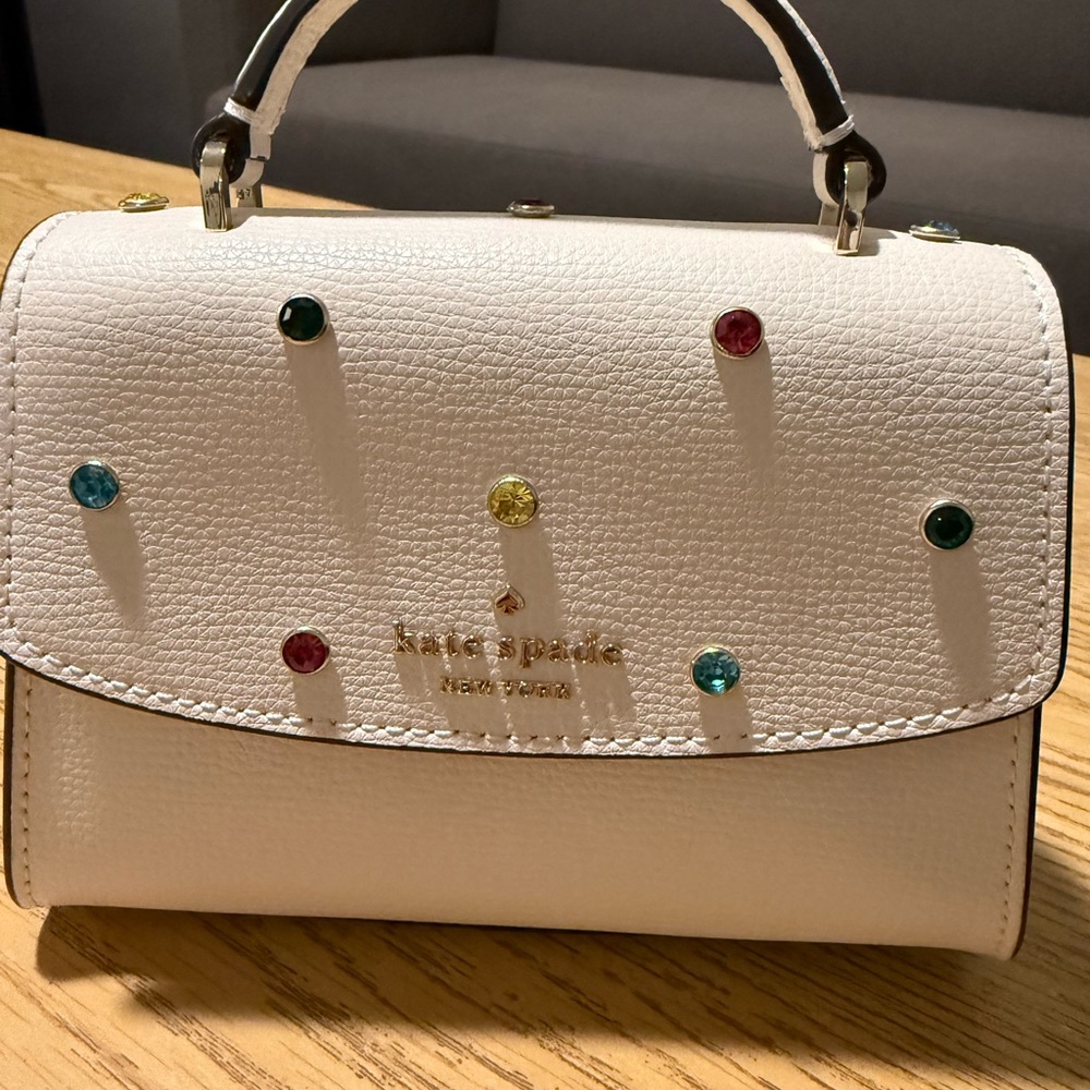 NWT Kate Spade White mini crossbody bag.